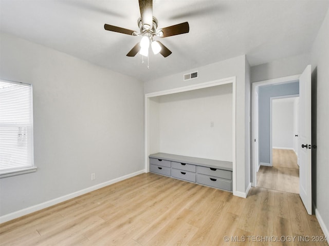 509 G St SW, Ardmore, OK 73401 - interior space with baseboards, a ceiling fan, light wood-style flooring, and visible vents