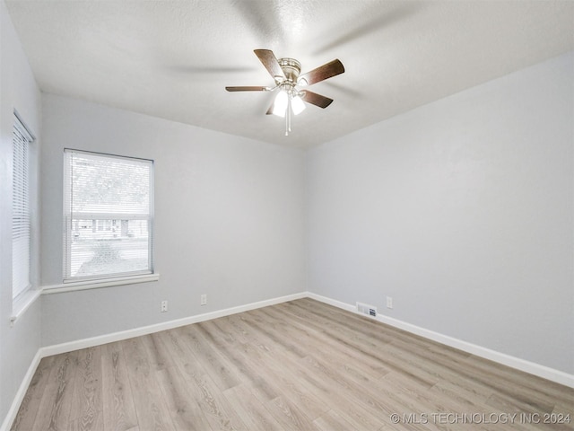509 G St SW, Ardmore, OK 73401 - spare room with a ceiling fan, visible vents, and light wood-style flooring