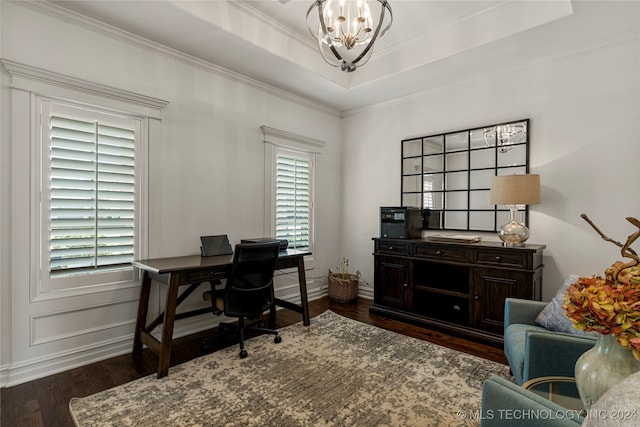 office area with a raised ceiling, ornamental molding, an inviting chandelier, and dark hardwood / wood-style floors