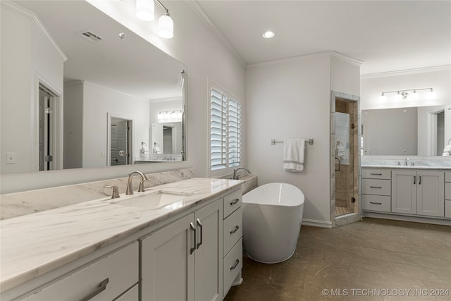 bathroom with vanity, crown molding, and shower with separate bathtub