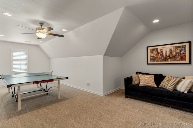 playroom featuring light carpet, vaulted ceiling, and ceiling fan