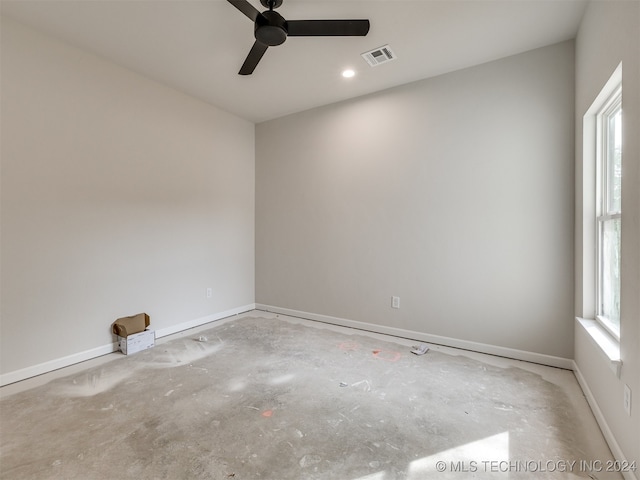 spare room featuring ceiling fan