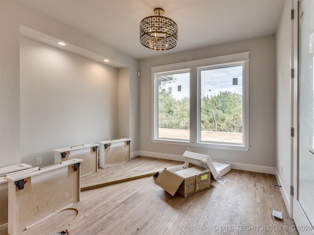 sitting room with light hardwood / wood-style flooring