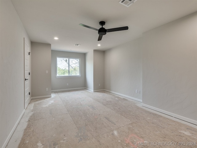 empty room featuring ceiling fan