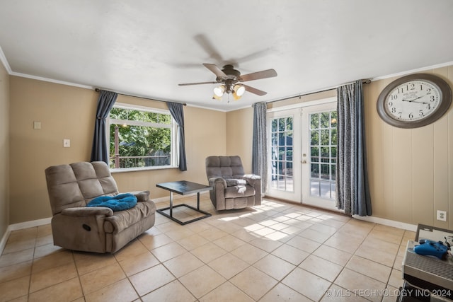 sitting room featuring french doors, ornamental molding, light tile patterned floors, and ceiling fan