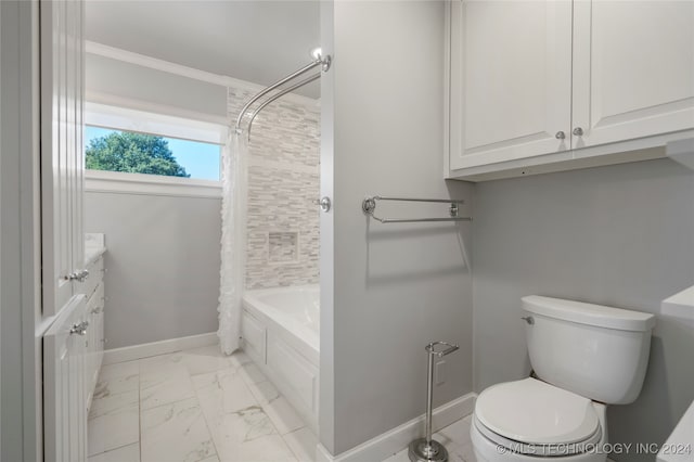 full bathroom with shower / bath combo, vanity, and toilet