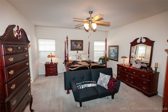 carpeted bedroom with ceiling fan