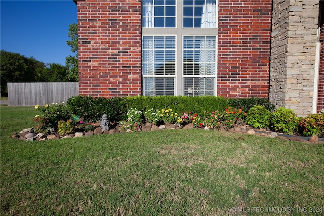 exterior space with a lawn