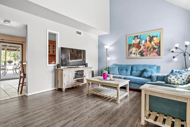 living room with dark hardwood / wood-style flooring