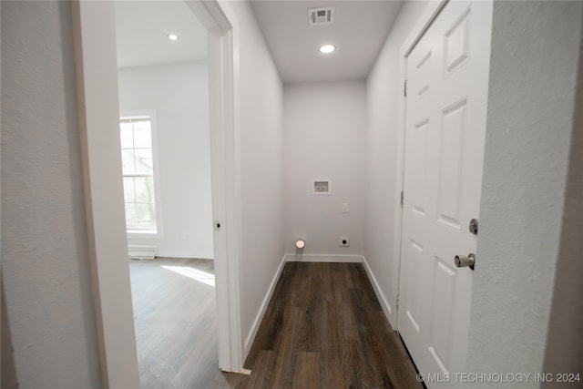 hallway featuring dark hardwood / wood-style flooring