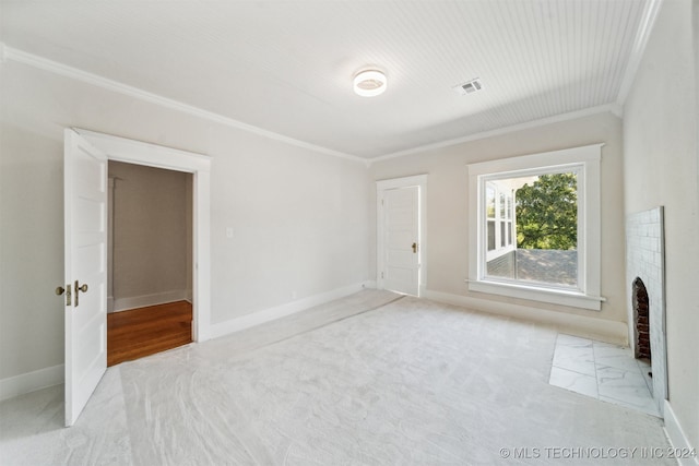 interior space featuring light carpet and crown molding