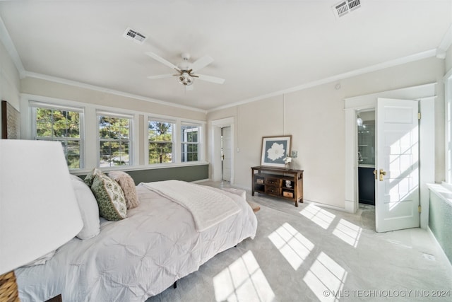 carpeted bedroom with ceiling fan, connected bathroom, and crown molding