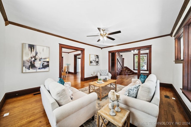 living room featuring ornamental molding, ceiling fan, and hardwood / wood-style floors