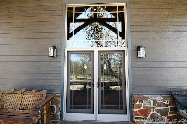 entrance to property featuring french doors