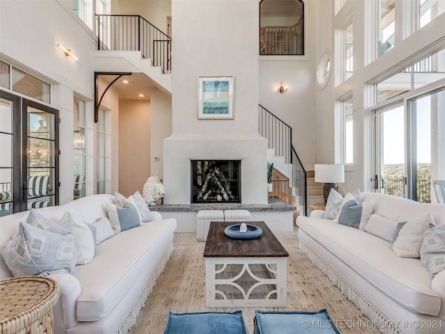 living room with a high ceiling