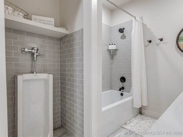 bathroom with shower / bath combination with curtain