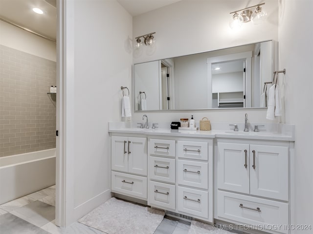 bathroom with vanity and independent shower and bath