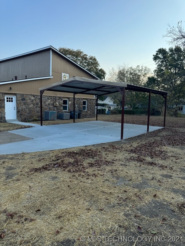 exterior space featuring a carport