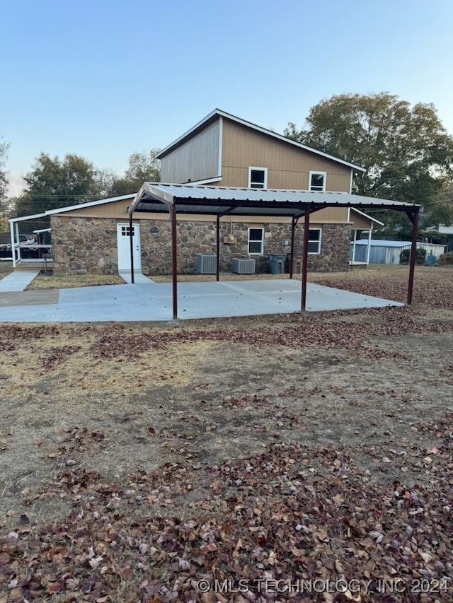 exterior space featuring central AC unit