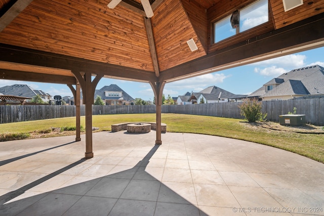 view of patio / terrace with a fire pit