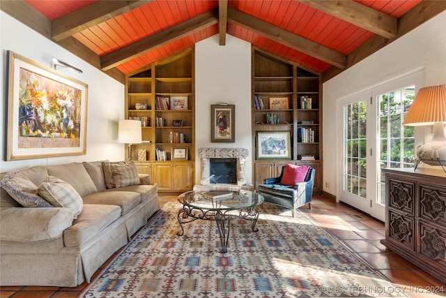 living room featuring built in shelves, vaulted ceiling with beams, tile patterned floors, and wooden ceiling