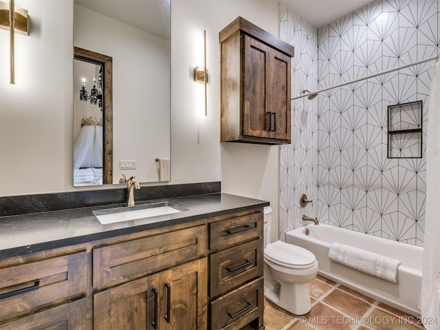 full bathroom featuring vanity, tile patterned flooring, shower / bathing tub combination, and toilet