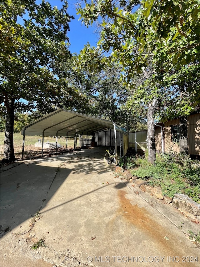 view of car parking featuring a carport