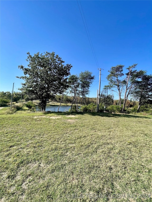 view of yard with a water view