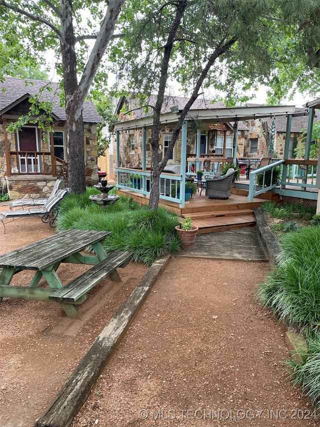 view of yard with a deck