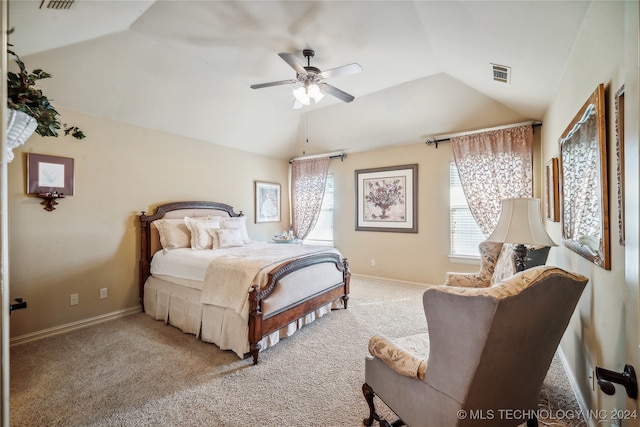 bedroom with ceiling fan, light carpet, and vaulted ceiling