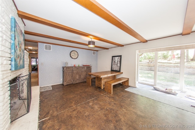 interior space featuring beam ceiling