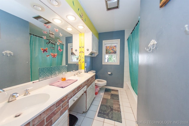 full bathroom with tile patterned floors, shower / bath combo, vanity, and toilet