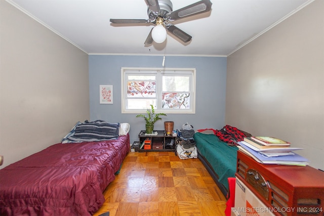 bedroom featuring light parquet floors, ornamental molding, and ceiling fan