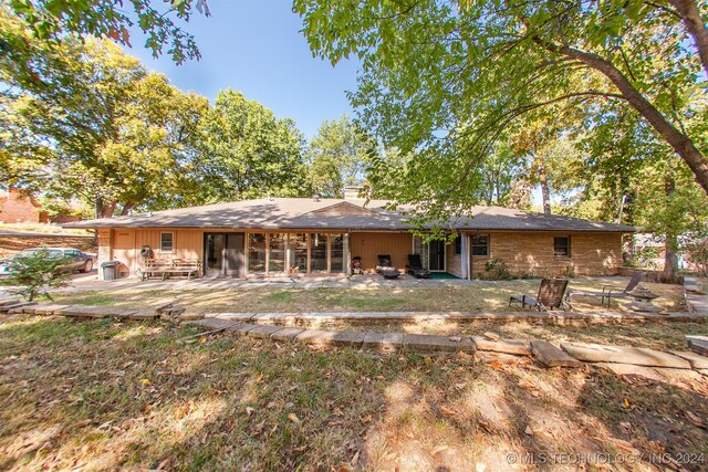 back of house featuring a patio