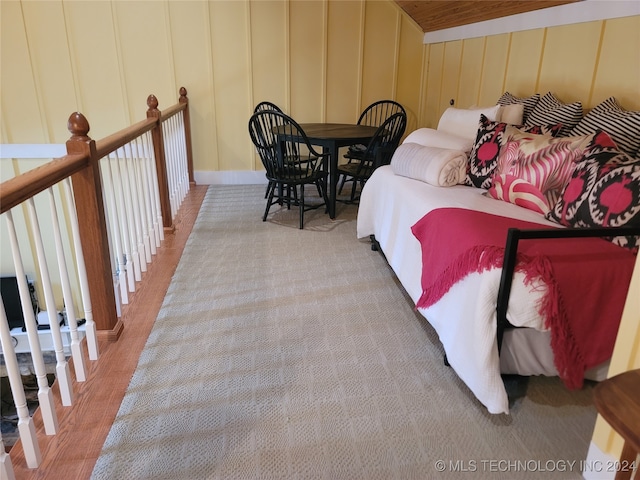 bedroom with hardwood / wood-style flooring