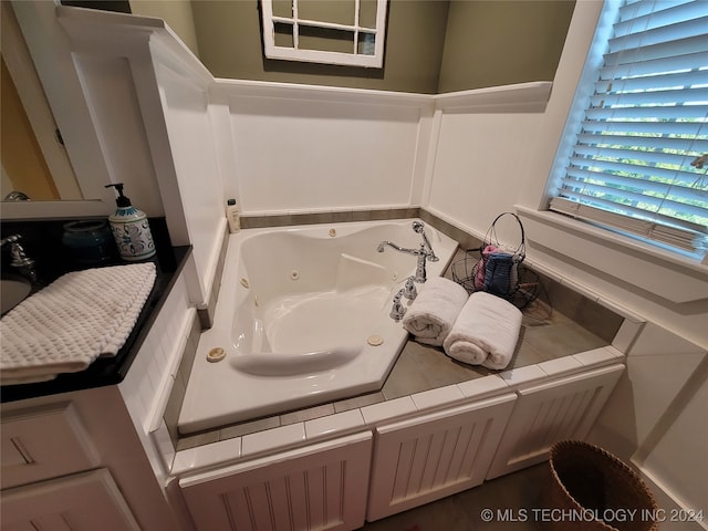 bathroom with a tub