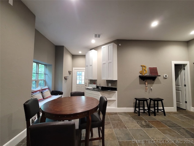 dining area featuring sink