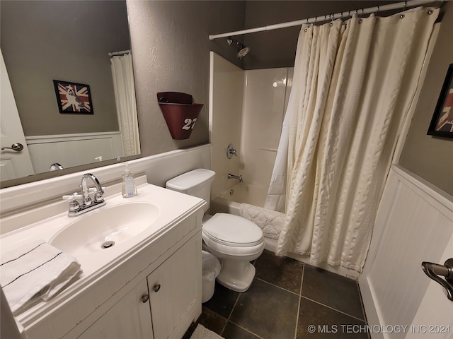 full bathroom featuring shower / bathtub combination with curtain, tile patterned flooring, vanity, and toilet