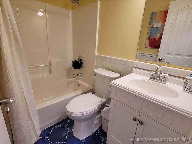 full bathroom featuring vanity, tile patterned flooring, toilet, and shower / bathtub combination with curtain