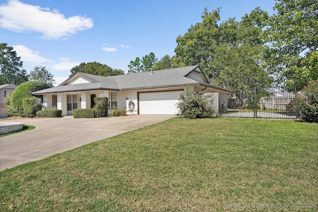 ranch-style home with a garage and a front lawn