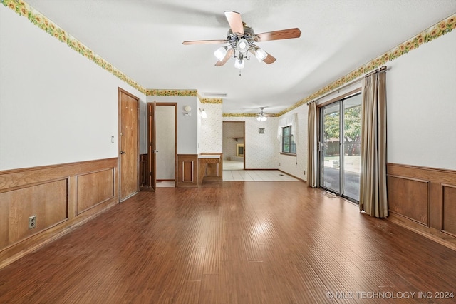 empty room featuring ceiling fan and wood-type flooring