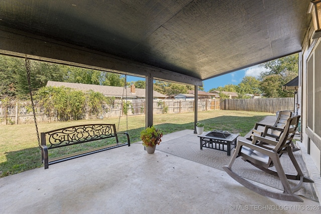 view of patio featuring an outdoor fire pit