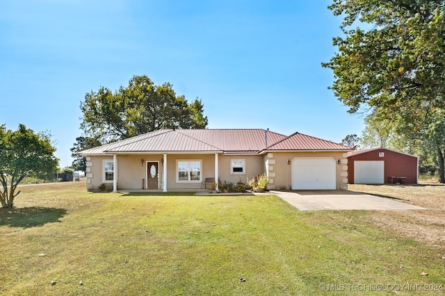 view of front facade featuring a garage and a front yard