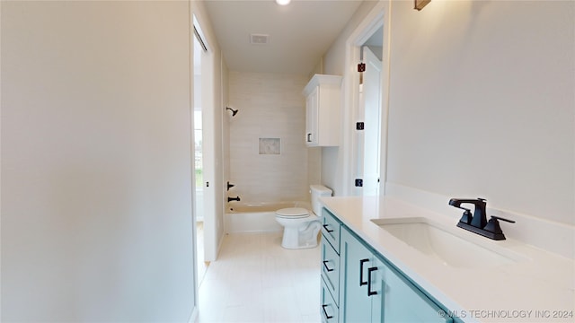 full bathroom with bathing tub / shower combination, vanity, toilet, and tile patterned floors