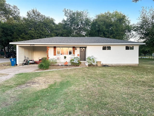 ranch-style home with a front yard