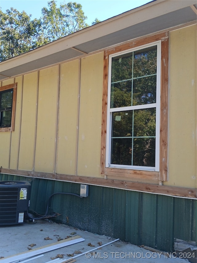 exterior details featuring central AC unit