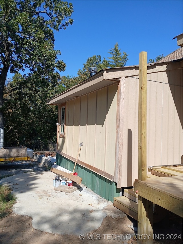 view of property exterior featuring a patio