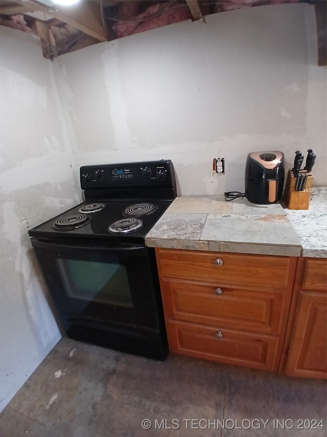 kitchen featuring black electric range oven