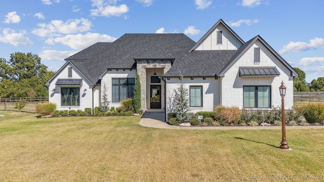 view of front facade featuring a front yard