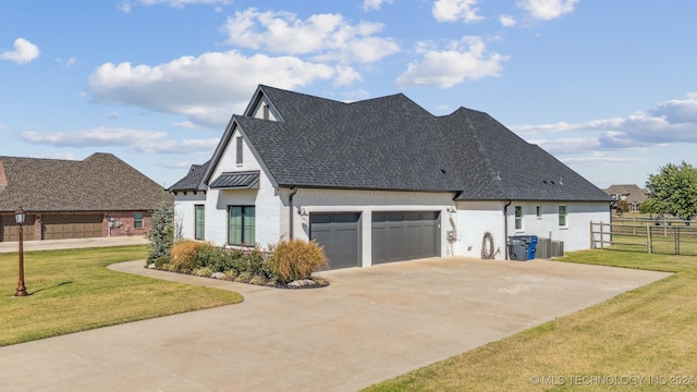 view of property exterior featuring a garage, a lawn, and central AC